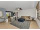 Spacious living room with neutral decor, wood floors, comfortable seating, and a dining area at 125 Donna Ct, Punta Gorda, FL 33950