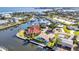 An aerial view of a waterfront community with many homes featuring docks, canals and boats at 125 Donna Ct, Punta Gorda, FL 33950