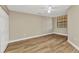 Bright bedroom with a ceiling fan and large windows at 1349 Aqui Esta Dr # 121, Punta Gorda, FL 33950