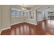 An open concept dining room area features a chandelier and many bright windows at 1349 Aqui Esta Dr # 121, Punta Gorda, FL 33950
