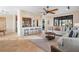 Open-concept living area with counter seating, easy access to outdoor spaces, and neutral decor at 14142 Fort Myers Ave, Port Charlotte, FL 33981