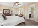 Large main bedroom with walk in closets and ensuite bath featuring neutral tones and great natural light at 14142 Fort Myers Ave, Port Charlotte, FL 33981
