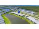 Enjoy the community's serene lakeside setting and pristine landscaping from this aerial view at 14224 Heritage Landing Blvd # 923, Punta Gorda, FL 33955