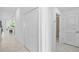 Bright hallway with closet leading to the kitchen and bathroom at 14224 Heritage Landing Blvd # 923, Punta Gorda, FL 33955