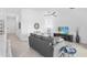 Open living room with neutral colors and a view of a lanai at 14224 Heritage Landing Blvd # 923, Punta Gorda, FL 33955