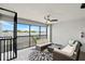 Comfortable screened-in patio with seating area and ceiling fan at 14224 Heritage Landing Blvd # 923, Punta Gorda, FL 33955