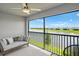 Screened patio area with view of lake and outdoor seating at 14224 Heritage Landing Blvd # 923, Punta Gorda, FL 33955