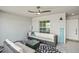 Bright, screened-in patio with comfortable seating and fan at 14224 Heritage Landing Blvd # 923, Punta Gorda, FL 33955