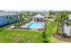 Beautiful community pool with lounge chairs, tables and umbrellas with plenty of seating at 14224 Heritage Landing Blvd # 923, Punta Gorda, FL 33955