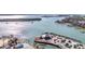 Stunning aerial view of the waterfront area with a pier, providing access to the beautiful waters at 1701 Beach Rd # 305, Englewood, FL 34223