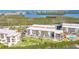 Beautiful waterfront condos with spacious balconies and lush landscaping, offering a serene living experience at 1701 Beach Rd # 305, Englewood, FL 34223
