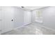 This bedroom features ample closet space and a window for natural light at 18263 Ohara Dr, Port Charlotte, FL 33948