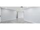 Spacious living room featuring neutral walls and tile flooring at 18263 Ohara Dr, Port Charlotte, FL 33948