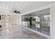 Inviting covered patio featuring stylish furniture and large sliding glass doors, ideal for indoor-outdoor living at 18263 Ohara Dr, Port Charlotte, FL 33948