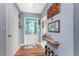 Inviting home entryway with wood floors and decorative accents at 20016 Sancraft Ave, Port Charlotte, FL 33954