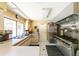 Well-equipped kitchen features stainless steel appliances, double sink, and commercial-grade range at 20016 Sancraft Ave, Port Charlotte, FL 33954