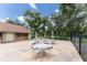 Outdoor patio area with tables and chairs, ideal for enjoying the fresh air and socializing at 20016 Sancraft Ave, Port Charlotte, FL 33954