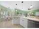 Spacious kitchen with updated appliances and an adjacent dining area with ample natural light at 2024 Royal Tern Cir, Punta Gorda, FL 33983