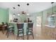 Bright and airy kitchen area with an adjacent dining area and cozy bar seating at 2024 Royal Tern Cir, Punta Gorda, FL 33983