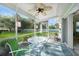 Covered lanai with ceiling fan, furniture, and view of the backyard at 2024 Royal Tern Cir, Punta Gorda, FL 33983