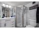 Updated bathroom features a glass shower with elegant marble tiling and a modern vanity at 2401 Bayshore Blvd # 1204, Tampa, FL 33629