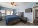 This primary bedroom features a ceiling fan, luxury flooring, and neutral tones at 2401 Bayshore Blvd # 1204, Tampa, FL 33629