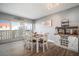Dining area boasts wood floors, sliding glass doors to the outside, and bar with wine storage at 2401 Bayshore Blvd # 1204, Tampa, FL 33629