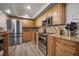 Modern kitchen featuring stainless steel appliances, granite countertops, and sleek backsplash at 2401 Bayshore Blvd # 1204, Tampa, FL 33629