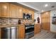 Well-lit kitchen with stainless steel appliances and plenty of cabinet space at 2401 Bayshore Blvd # 1204, Tampa, FL 33629