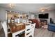 Open concept living space features kitchen, dining area, and living room at 2401 Bayshore Blvd # 1204, Tampa, FL 33629