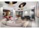 Spacious lobby with designer lighting, modern fireplace, comfortable seating and a piano at 2401 Bayshore Blvd # 1204, Tampa, FL 33629
