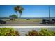 Scenic waterfront view with palm trees, bay views, and a vibrant cityscape, perfect for a relaxed coastal lifestyle at 2401 Bayshore Blvd # 1204, Tampa, FL 33629