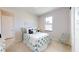 Bedroom with carpet floors and decorated with blue and green decor at 24103 Pyramid Way, Punta Gorda, FL 33955