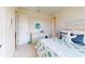 Bedroom with carpet floors and decorated with blue and green decor at 24103 Pyramid Way, Punta Gorda, FL 33955