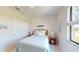 Bedroom with carpet floors and decorated with blue decor at 24103 Pyramid Way, Punta Gorda, FL 33955