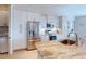 Gourmet kitchen with stainless steel appliances, granite countertops, and bright white cabinetry at 24103 Pyramid Way, Punta Gorda, FL 33955