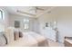 Calm bedroom featuring a bed with soft bedding, a white dresser, and soothing decor at 24103 Pyramid Way, Punta Gorda, FL 33955