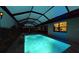 Private covered pool area, perfect for relaxing and entertaining at night at 24103 Pyramid Way, Punta Gorda, FL 33955