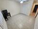 Bedroom featuring neutral tile floors, ceiling fan and closet at 243 Harbor Blvd, Port Charlotte, FL 33954