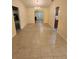 Open dining room has tiled flooring and arched entries for seamless transition between rooms at 243 Harbor Blvd, Port Charlotte, FL 33954
