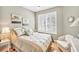 Inviting bedroom with plantation shutters and stylish decor, offering a comfortable and relaxing space at 2508 Magnolia Cir, North Port, FL 34289