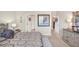 Bedroom featuring a comfortable bed and decor, and with multiple doorways leading to other parts of the home at 2508 Magnolia Cir, North Port, FL 34289