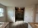 Bathroom showcasing a large walk-in shower with glass doors and dual vanities at 25156 Rosamond Ct, Punta Gorda, FL 33983