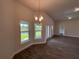 The dining area showcases views of the outdoors and provides ample natural light at 25156 Rosamond Ct, Punta Gorda, FL 33983