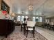 Charming dining room boasting stylish decor, and comfortable seating, ideal for Gathering meals and entertaining guests at 25263 Padre Ln, Punta Gorda, FL 33983