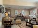 Comfortable living room featuring stylish decor, neutral tones, and cozy seating, perfect for relaxation and entertaining at 25263 Padre Ln, Punta Gorda, FL 33983