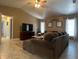 Bright living room with modern decor and large sectional couch at 25263 Padre Ln, Punta Gorda, FL 33983