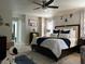 Comfortable main bedroom is furnished with stylish decor and furniture with lots of natural light at 25263 Padre Ln, Punta Gorda, FL 33983