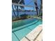 Beautiful pool featuring stone trim and steps with relaxing waterfront views at 2575 Brazilia Ct, Punta Gorda, FL 33950