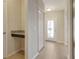 The welcoming entryway features a granite countertop and a glass-paneled front door, with tiled flooring for easy maintenance at 27854 Arrowhead Cir, Punta Gorda, FL 33982